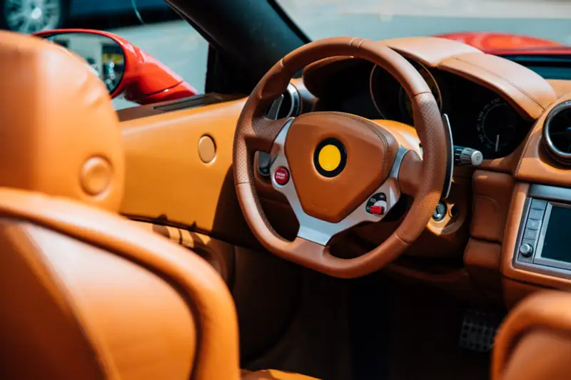 Tan leather steering wheel and dashboard