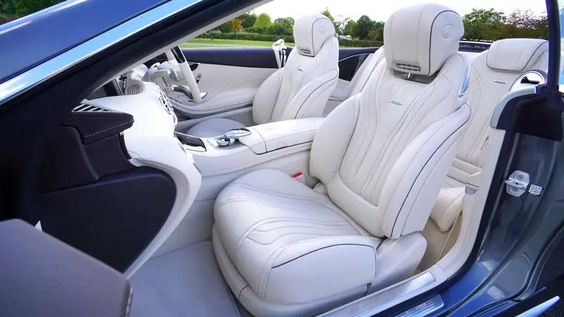 Cream leather seats in an open-top car