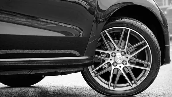Gloss black paint and a polished alloy wheel